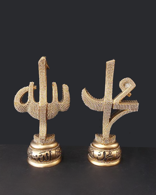 Coppia statue color oro con strass