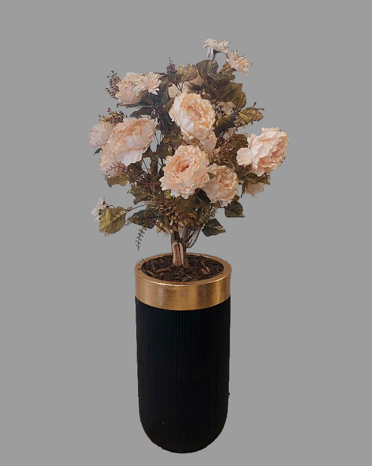 Vaso nero e oro con pianta di fiori