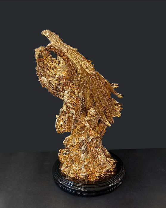 Statua aquila oro o argento