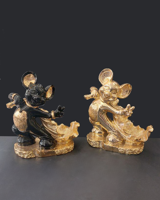Statua topolino svuota tasche