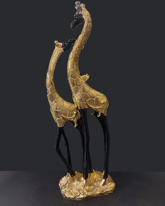 Statua giraffe nero e oro o bianco e oro