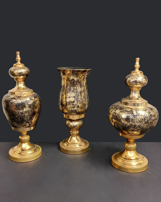 Tris di decorazioni oro e nero