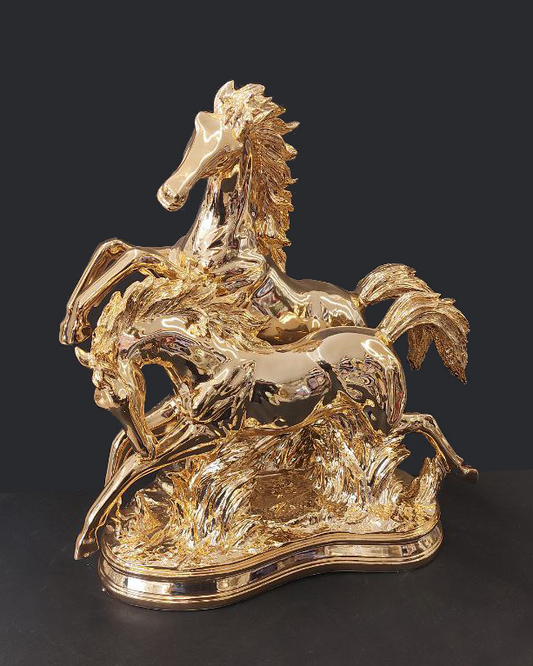 Statua cavalli color oro