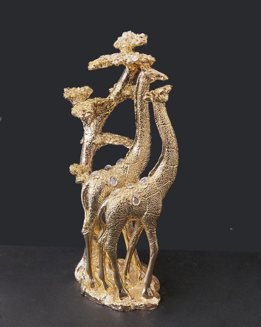 Statua due giraffe color oro