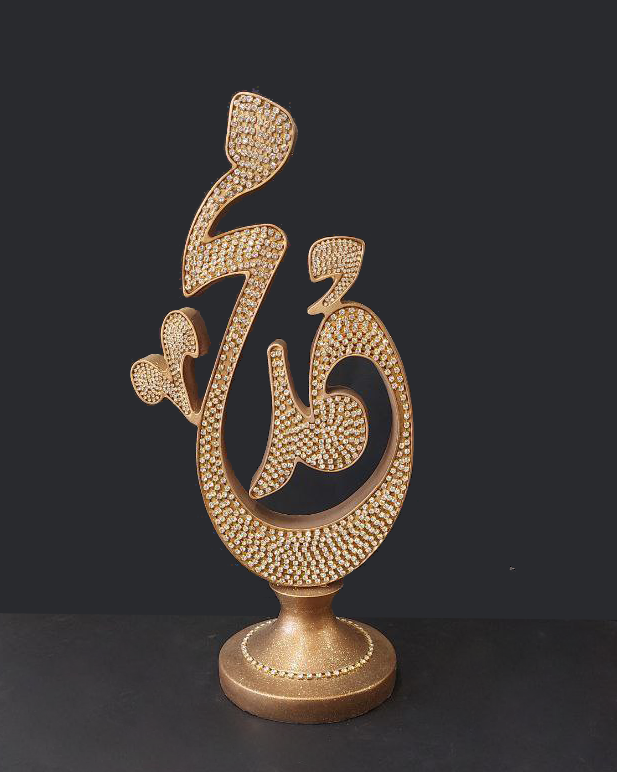 Coppia di statue color oro con strass