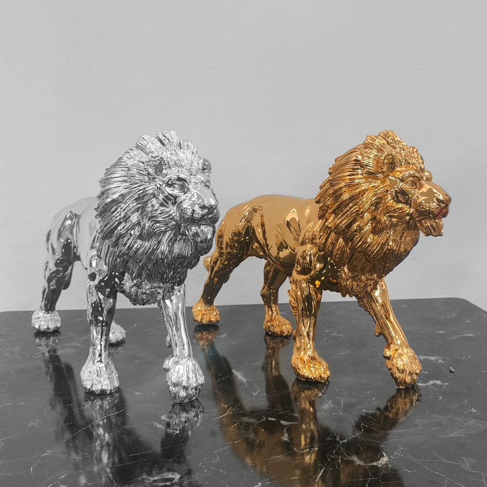 Statua leone oro o argento
