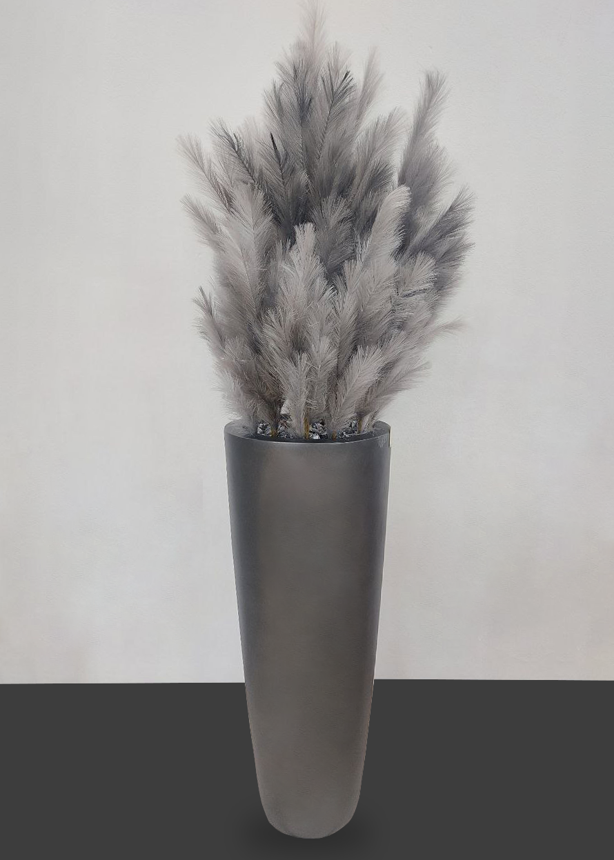 Vaso con piume